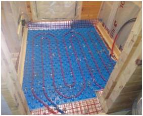 Основные нюансы при установке теплого пола в доме из клееного бруса